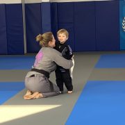 Beginner Jiu Jitsu in Exeter, NH: Start Your Journey with Renzo Gracie – Hero Image Parents and children working out together